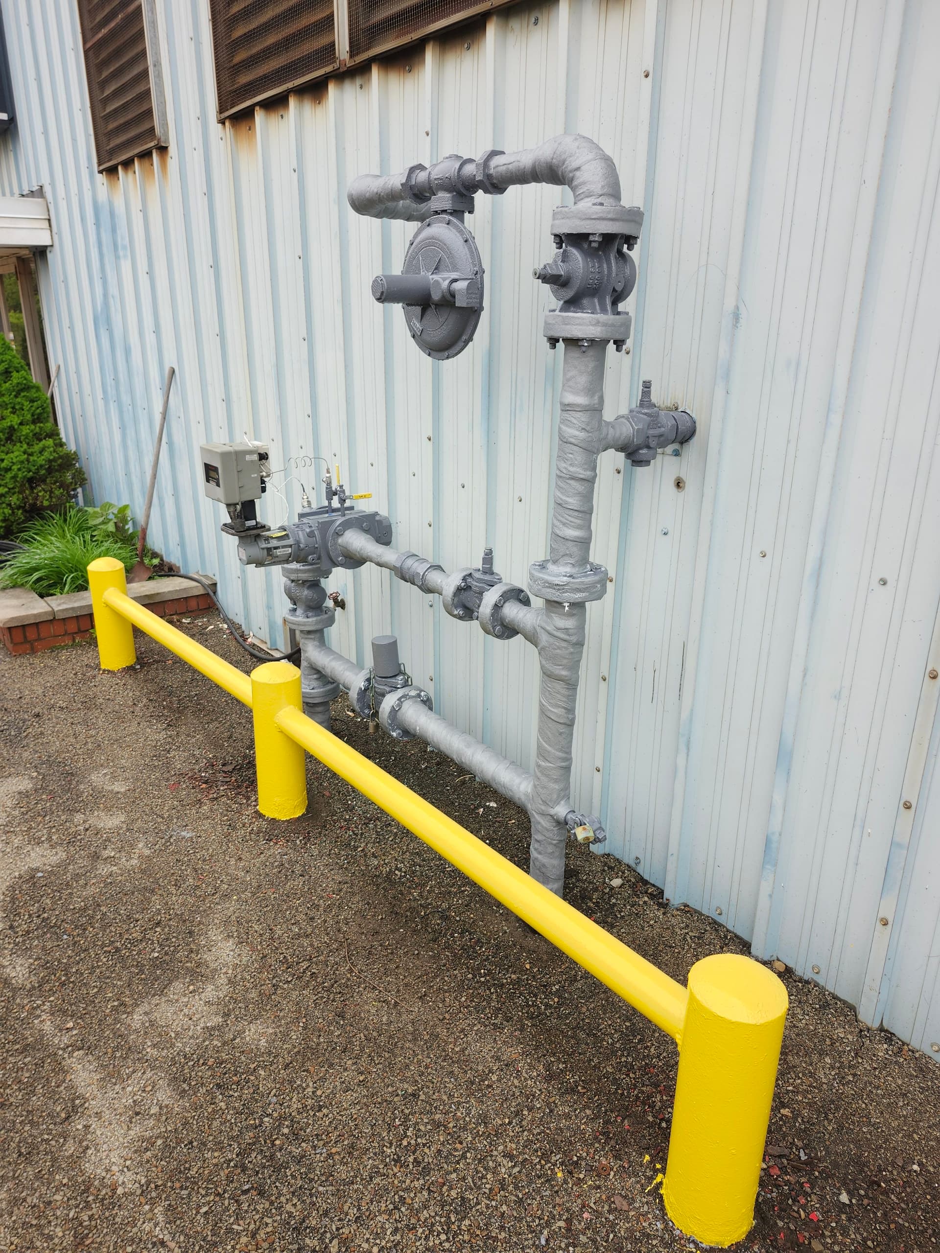 Gallery photos for Fresh Coating on Industrial Gas Piping and Safety Bollards: Image #1